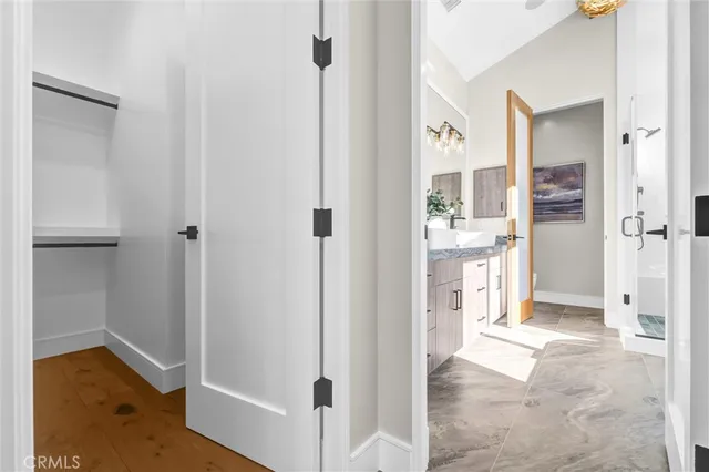 a view of a bathroom with a tub and shower