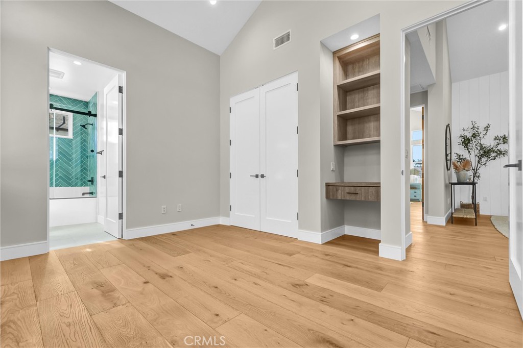 2016 Farrell Avenue, Unit A Redondo Beach, CA 90278 - Photo 29 of 42 a view of empty room with wooden floor and windows