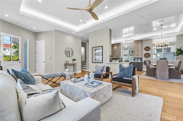 a living room with furniture and flat screen tv