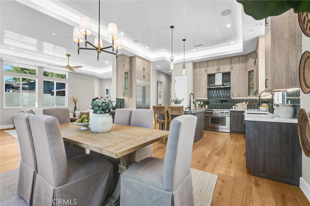 2016 Farrell Avenue, Unit A Redondo Beach, CA 90278 - Photo 9 of 42 a view of a dining room and livingroom with furniture wooden floor a chandelier