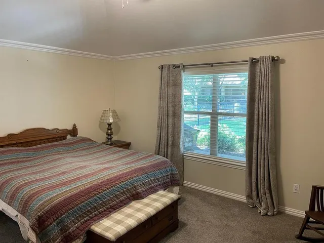 a room with a dresser