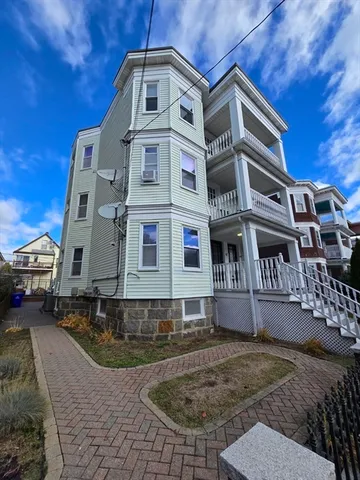 a large building with a clock on the top