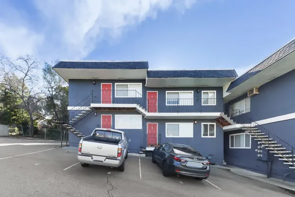 a car parked in front of a building
