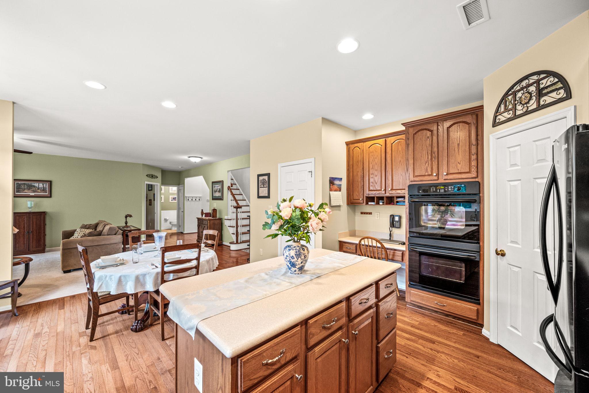 103 Riverside Lane Coatesville, PA 19320 - Photo 19 of 52 Inviting kitchen with warm wooden accents.