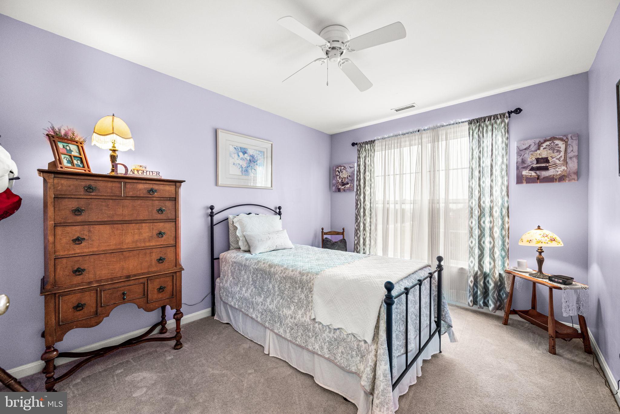 103 Riverside Lane Coatesville, PA 19320 - Photo 22 of 52 Charming pastel bedroom with natural light.