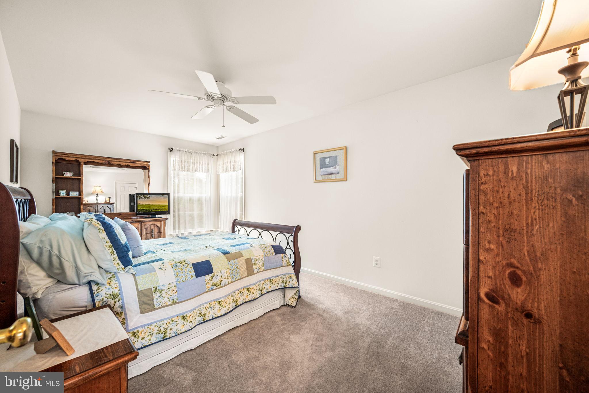 103 Riverside Lane Coatesville, PA 19320 - Photo 23 of 52 Serene bedroom with natural light and charm.