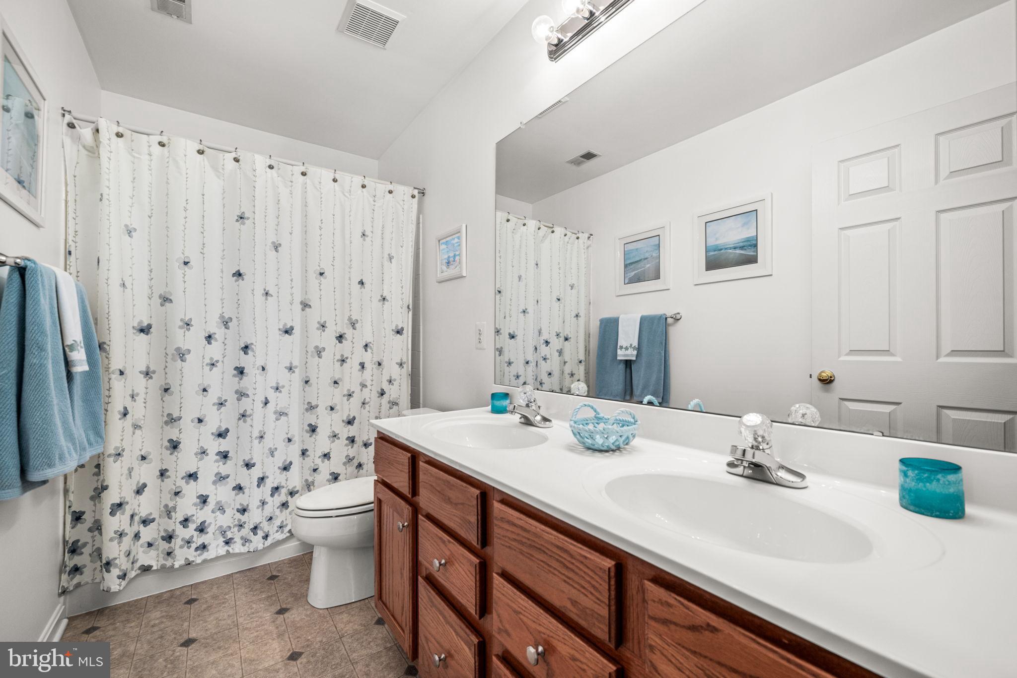 103 Riverside Lane Coatesville, PA 19320 - Photo 24 of 52 Bright and airy bathroom with coastal accents.