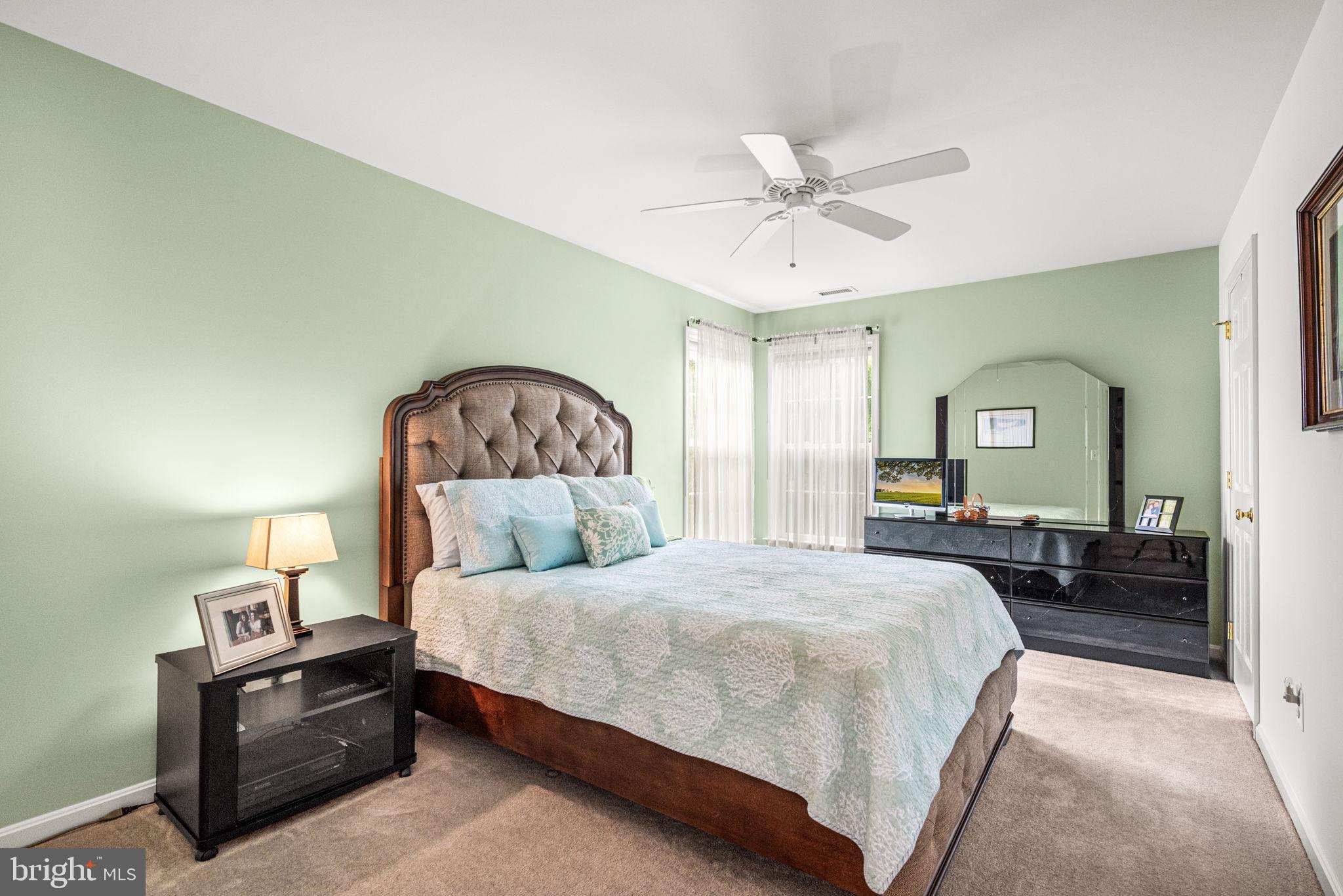 103 Riverside Lane Coatesville, PA 19320 - Photo 25 of 52 Serene bedroom with soft green hues.