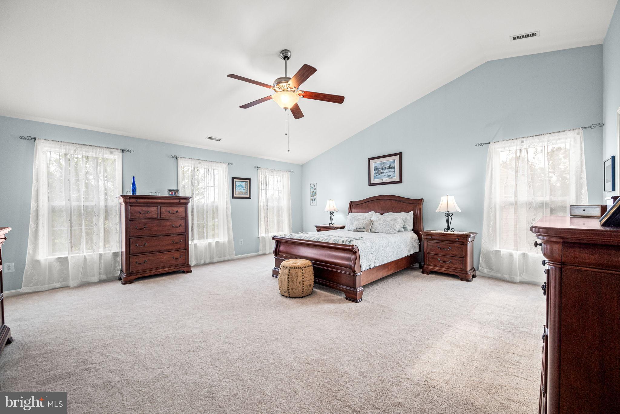 103 Riverside Lane Coatesville, PA 19320 - Photo 26 of 52 Spacious bedroom with serene natural light.