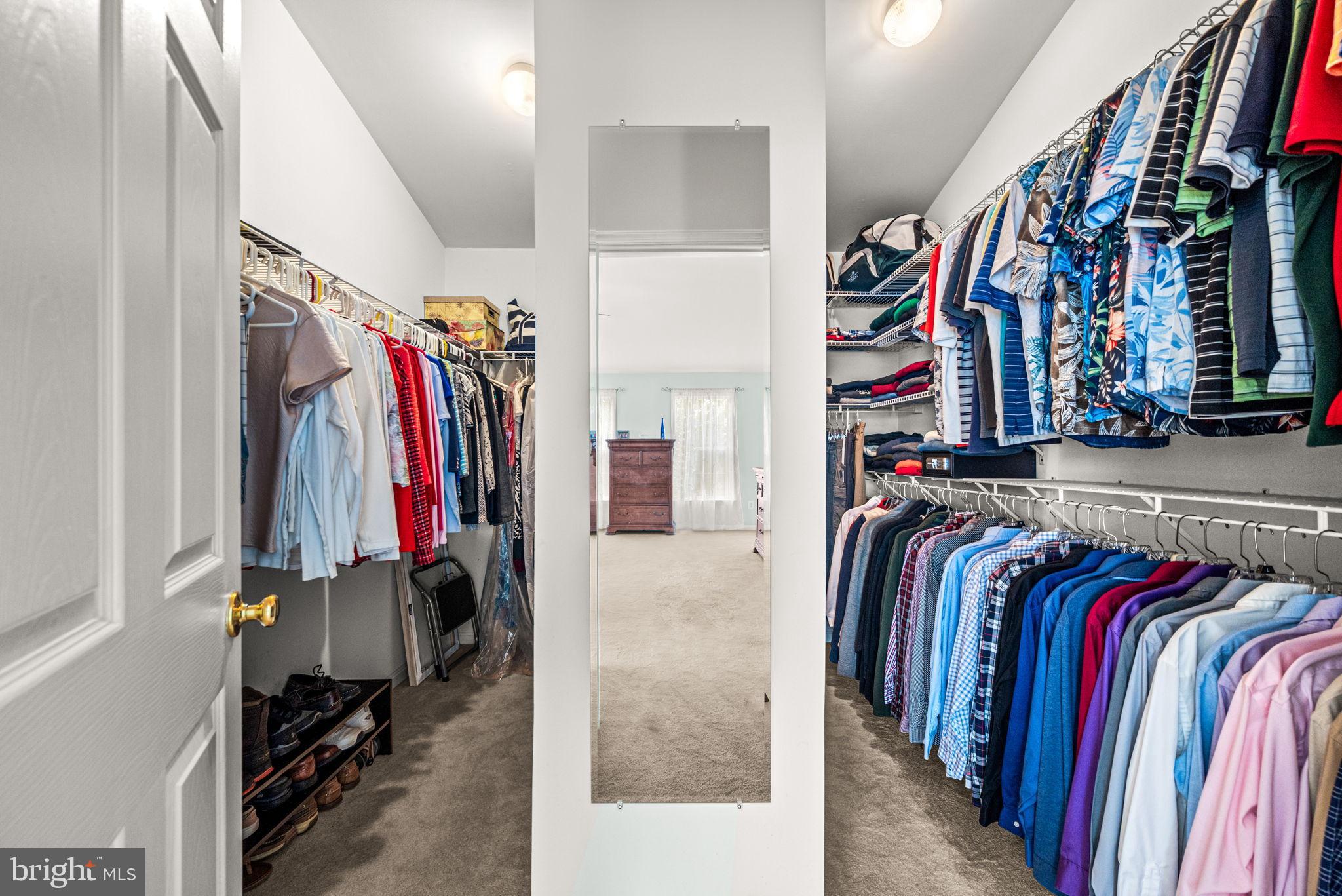 103 Riverside Lane Coatesville, PA 19320 - Photo 28 of 52 Spacious walk-in closet with organized attire.
