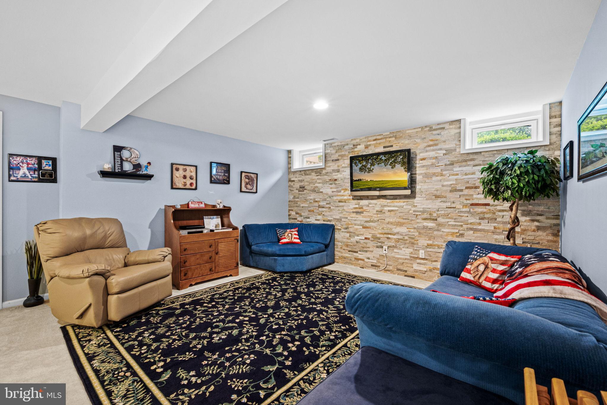 103 Riverside Lane Coatesville, PA 19320 - Photo 35 of 52 Cozy basement retreat with stylish accents.