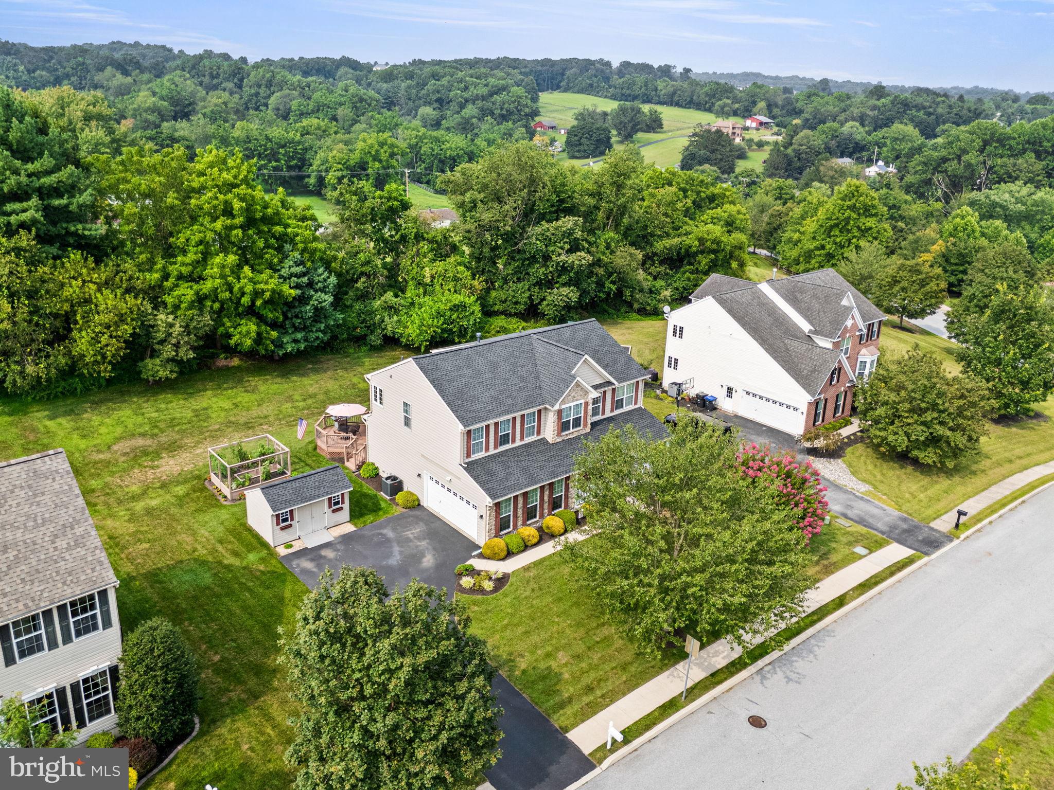 103 Riverside Lane Coatesville, PA 19320 - Photo 46 of 52 Charming homes nestled in lush greenery.