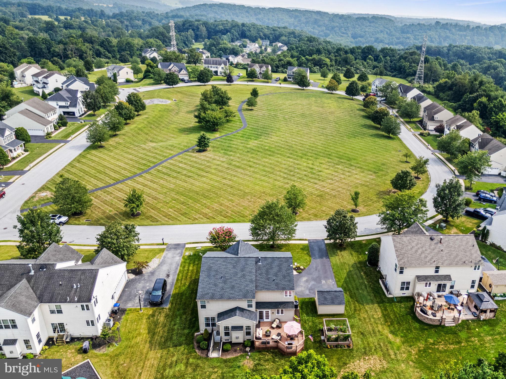 103 Riverside Lane Coatesville, PA 19320 - Photo 48 of 52 Serene suburban landscape with lush greenery.