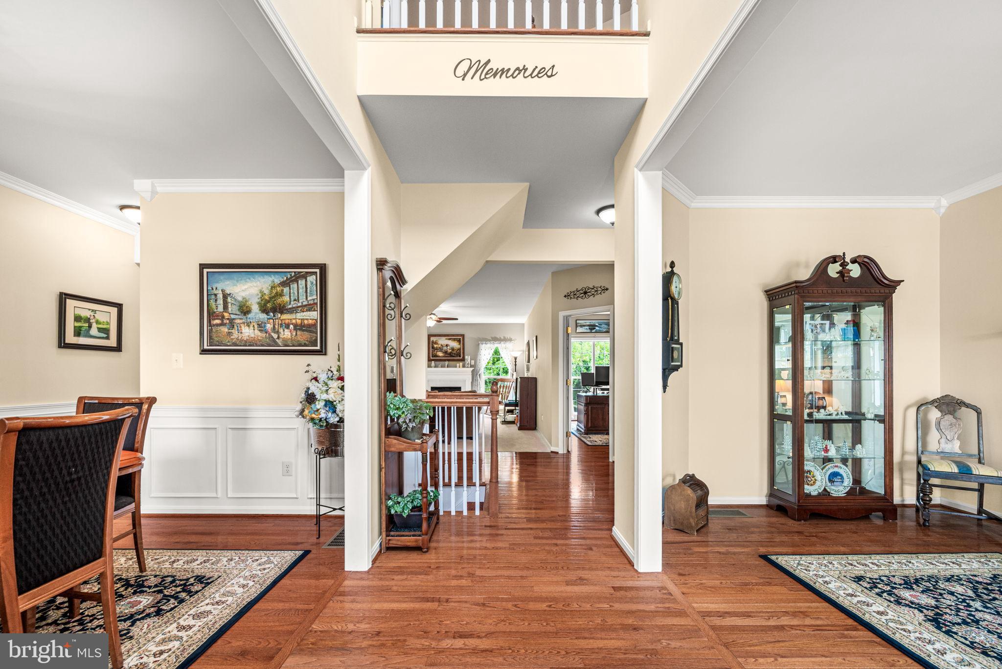 103 Riverside Lane Coatesville, PA 19320 - Photo 6 of 52 Inviting foyer with warm wooden accents.
