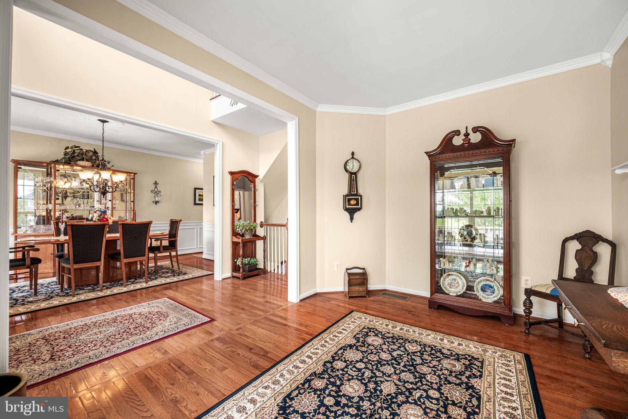 103 Riverside Lane Coatesville, PA 19320 - Photo 8 of 52 Elegant entryway with rich wood accents.
