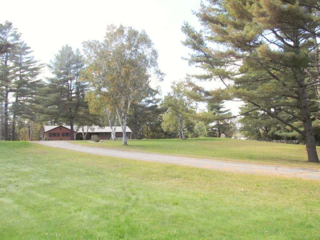 878 River Road North Anson, ME 04958 - Photo 4 of 36 Nice landscaped lawn and driveway to...