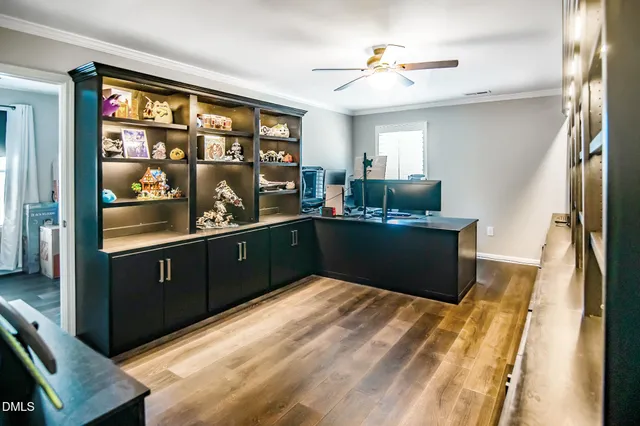 a kitchen with a sink cabinets and appliances