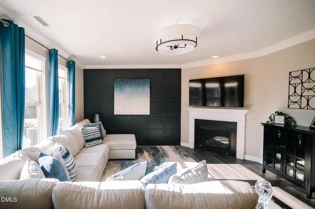 a bedroom with a bed and a fireplace