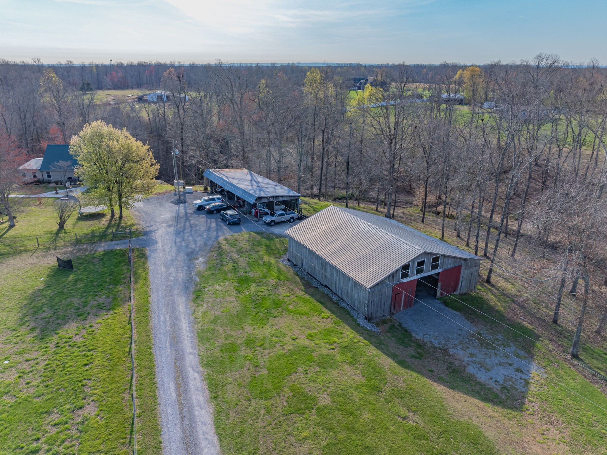 545 Powell Hollow Road Tullahoma, TN 37388 - Photo 44 of 67 House (behind tree) shed & barn
