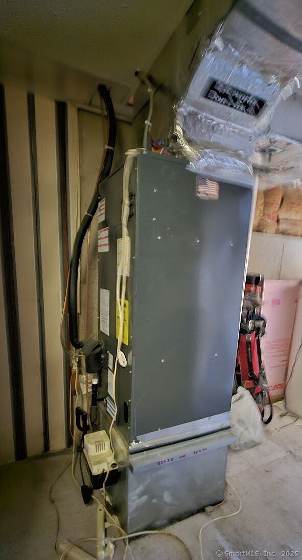 489 Wolcott Street, Unit 47 Bristol, CT 06010 - Photo 28 of 32 a view of storage and utility room