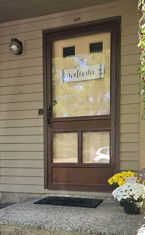 489 Wolcott Street, Unit 47 Bristol, CT 06010 - Photo 4 of 32 a view of door