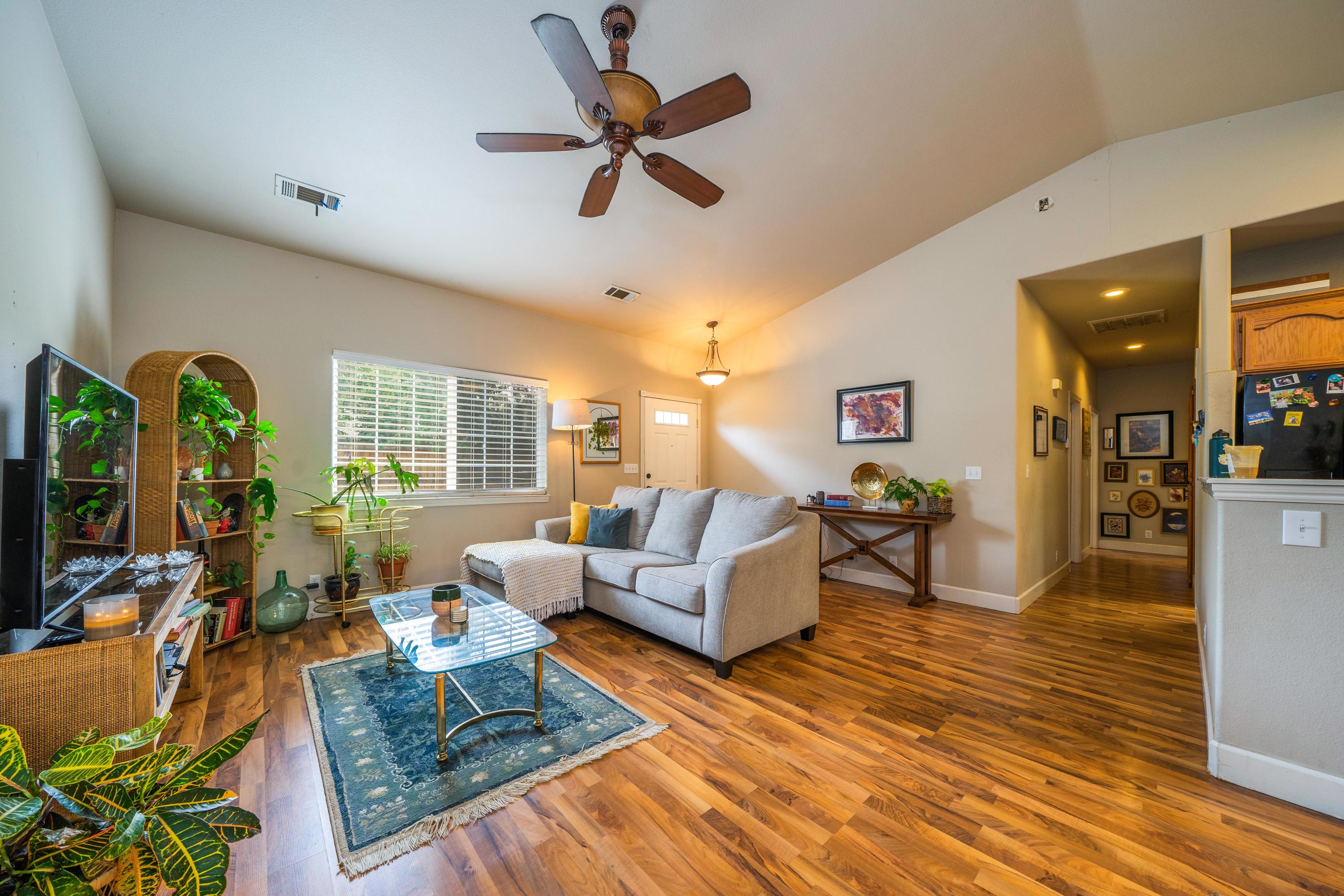 5484 Cedars Road Redding, CA 96001 - Photo 2 of 11 a living room with furniture and a wooden floor