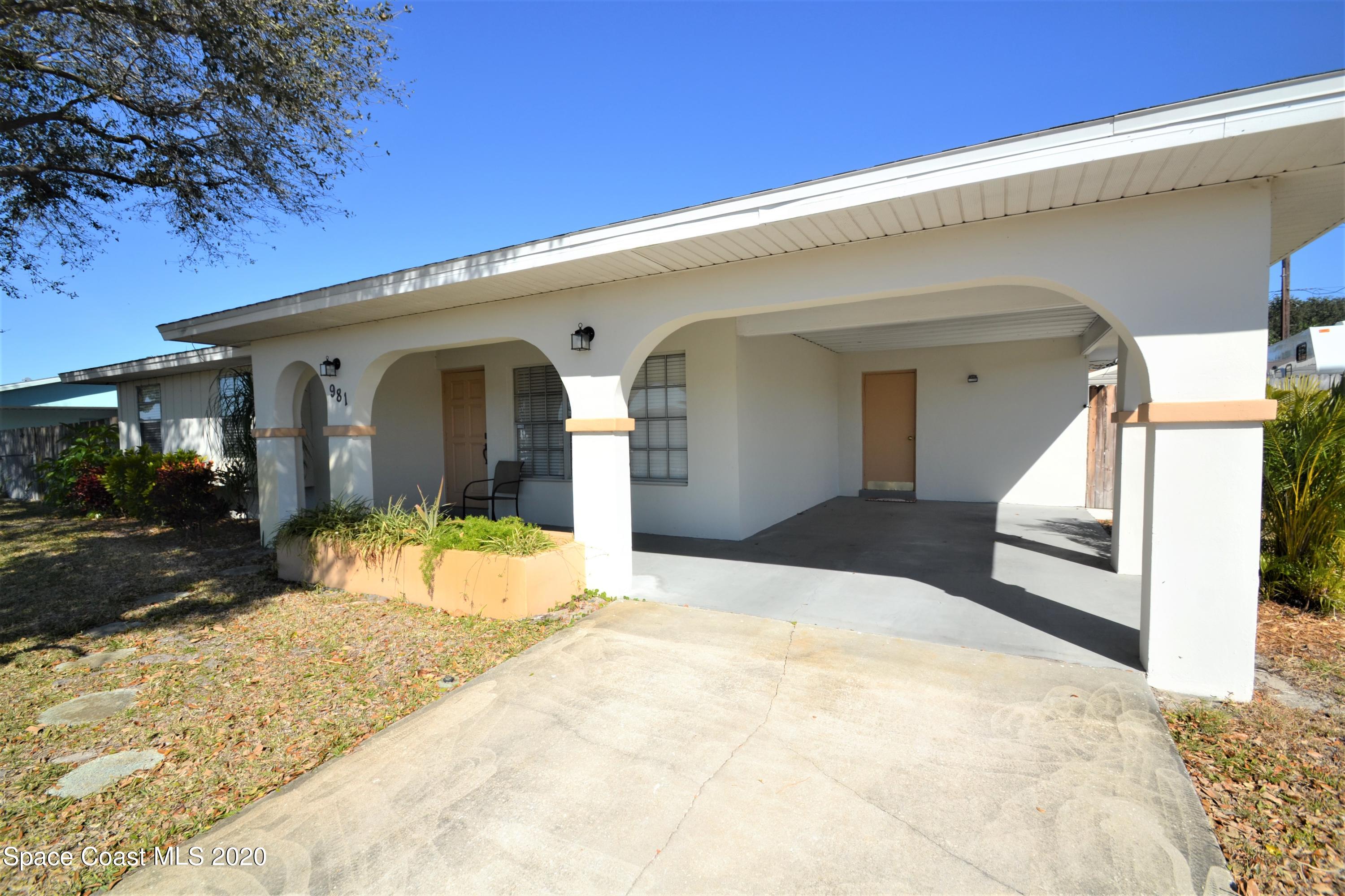 981 Bacon Circle Northeast Palm Bay, FL 32905 - Photo 2 of 26 981 Bacon Cir Front (1)