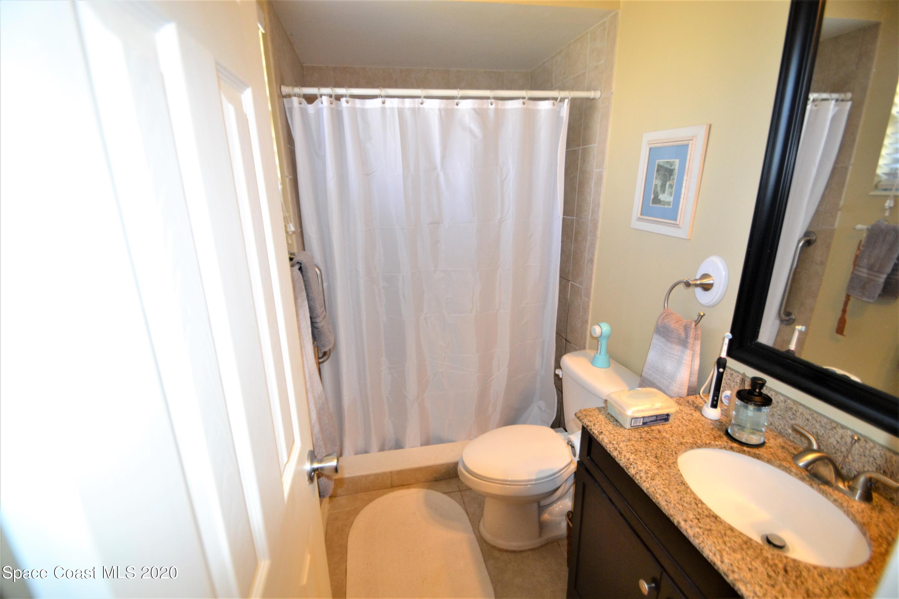 981 Bacon Circle Northeast Palm Bay, FL 32905 - Photo 13 of 26 981 Bacon Cir Master Bath (2)