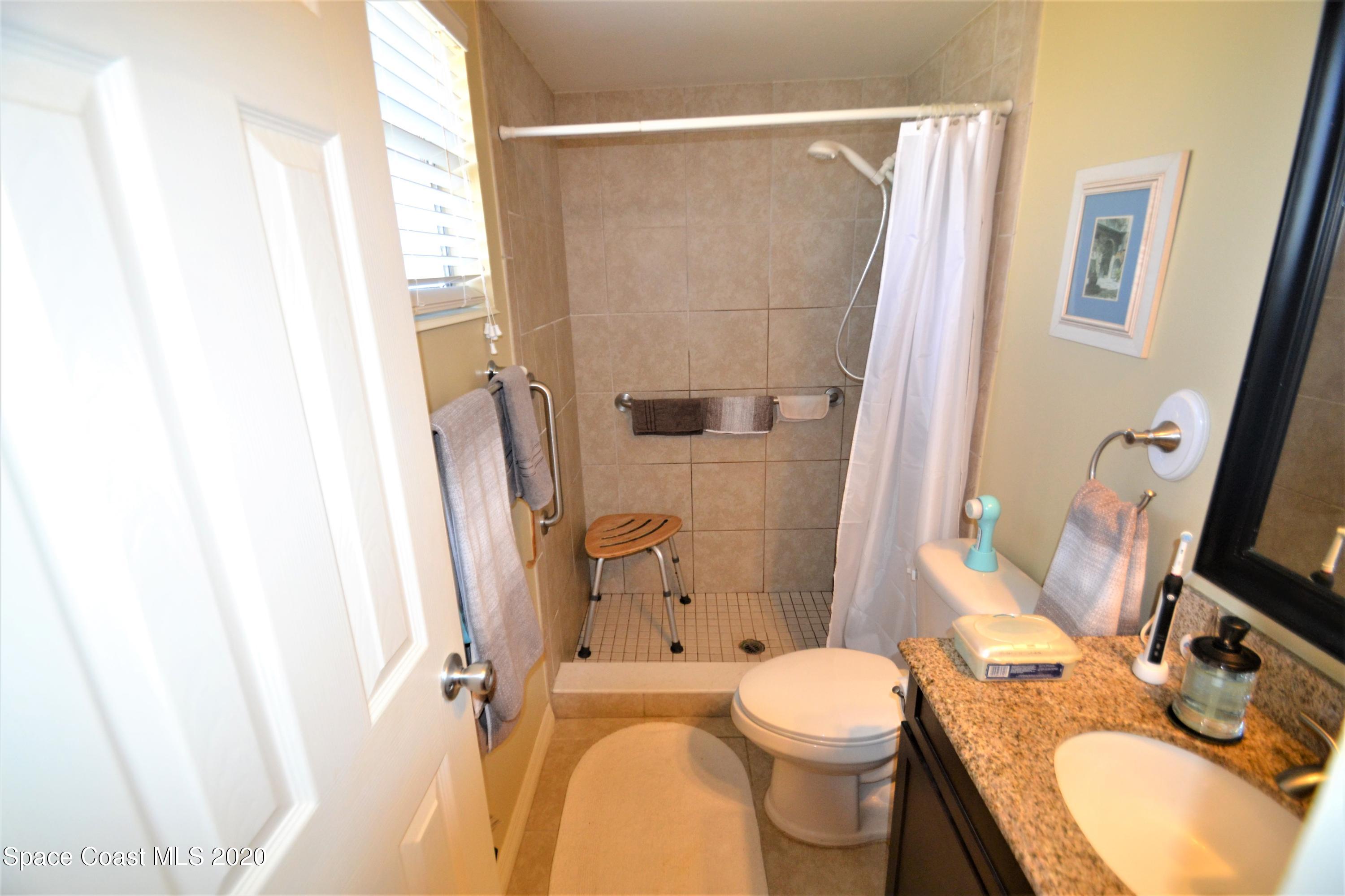 981 Bacon Circle Northeast Palm Bay, FL 32905 - Photo 14 of 26 981 Bacon Cir Master Bath (1)