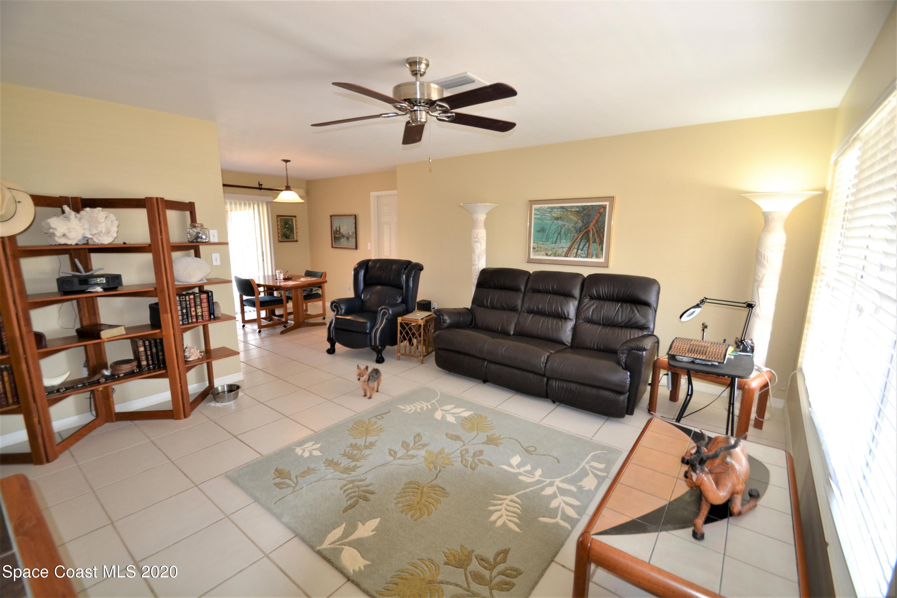 981 Bacon Circle Northeast Palm Bay, FL 32905 - Photo 3 of 26 981 Bacon Cir Family (6)