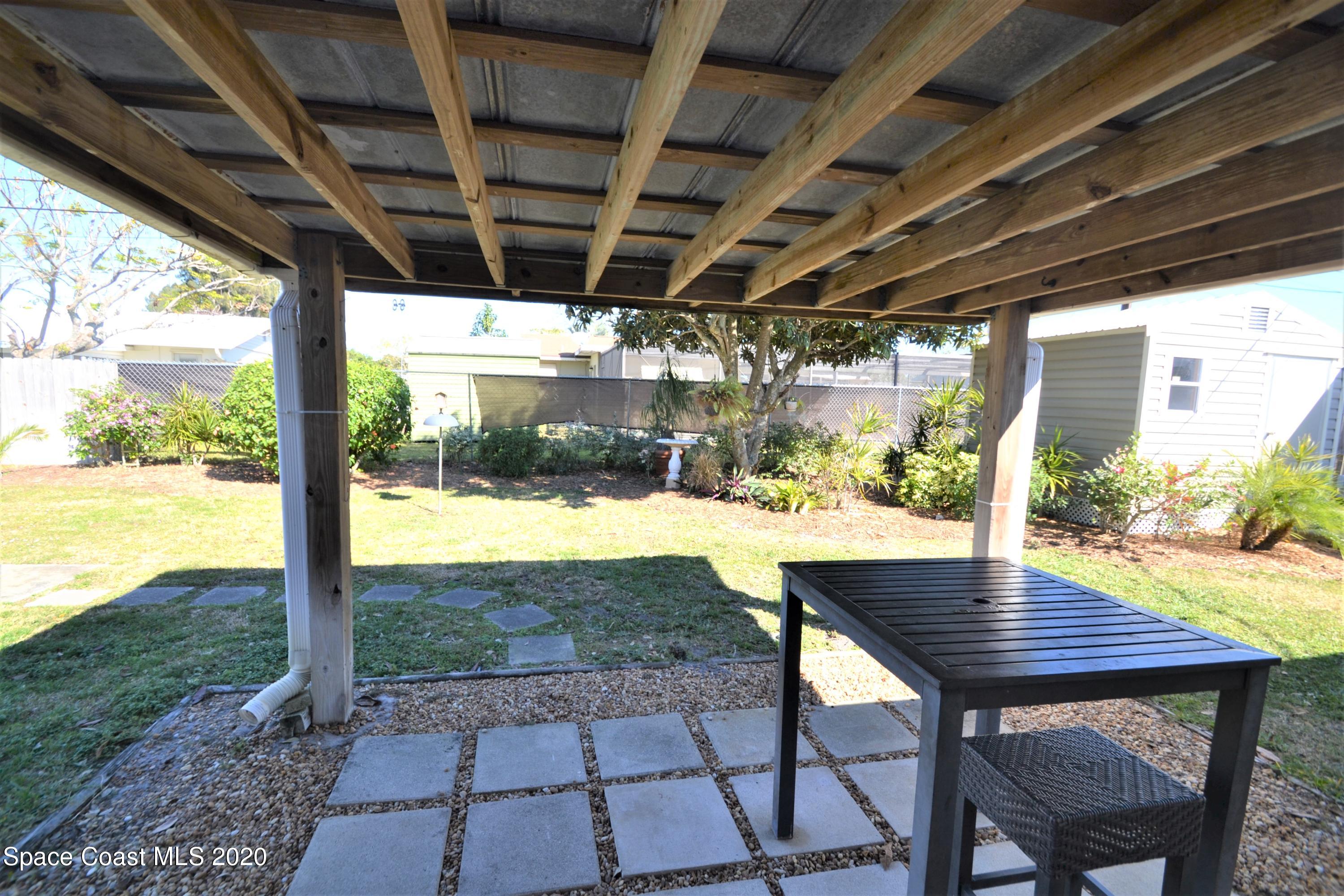 981 Bacon Circle Northeast Palm Bay, FL 32905 - Photo 22 of 26 981 Bacon Cir Backyard (3)