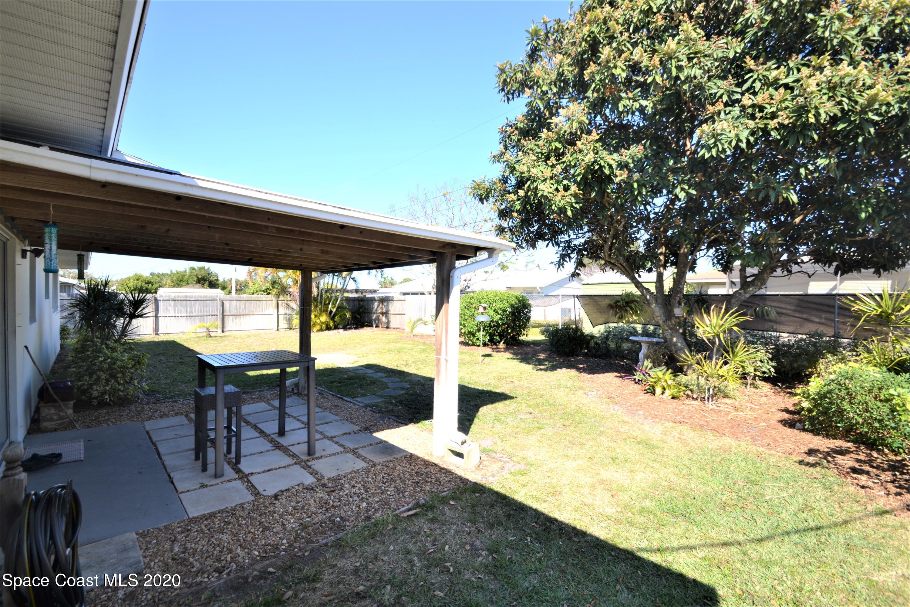 981 Bacon Circle Northeast Palm Bay, FL 32905 - Photo 23 of 26 981 Bacon Cir Backyard (5)
