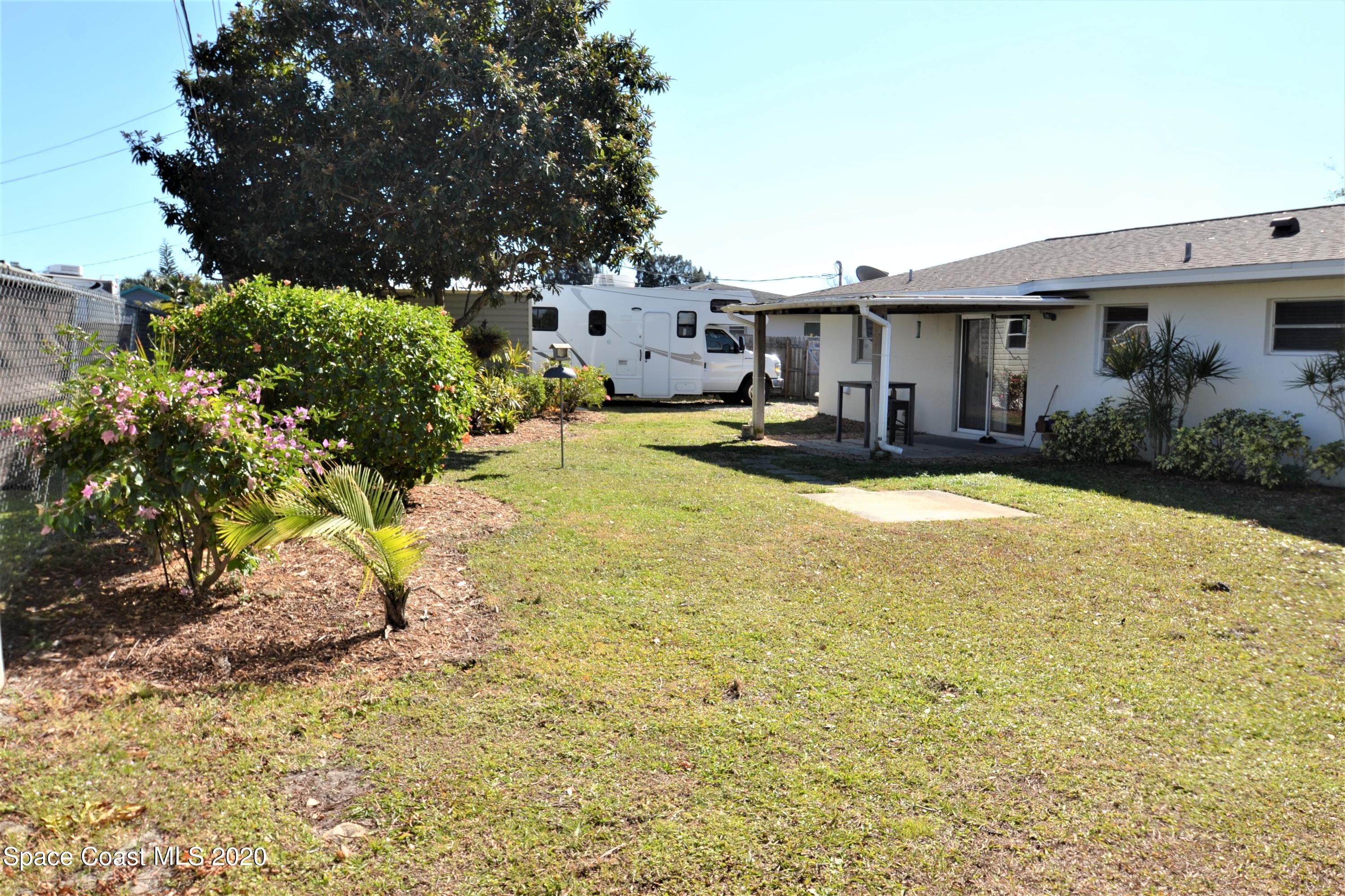 981 Bacon Circle Northeast Palm Bay, FL 32905 - Photo 24 of 26 981 Bacon Cir Backyard (14)