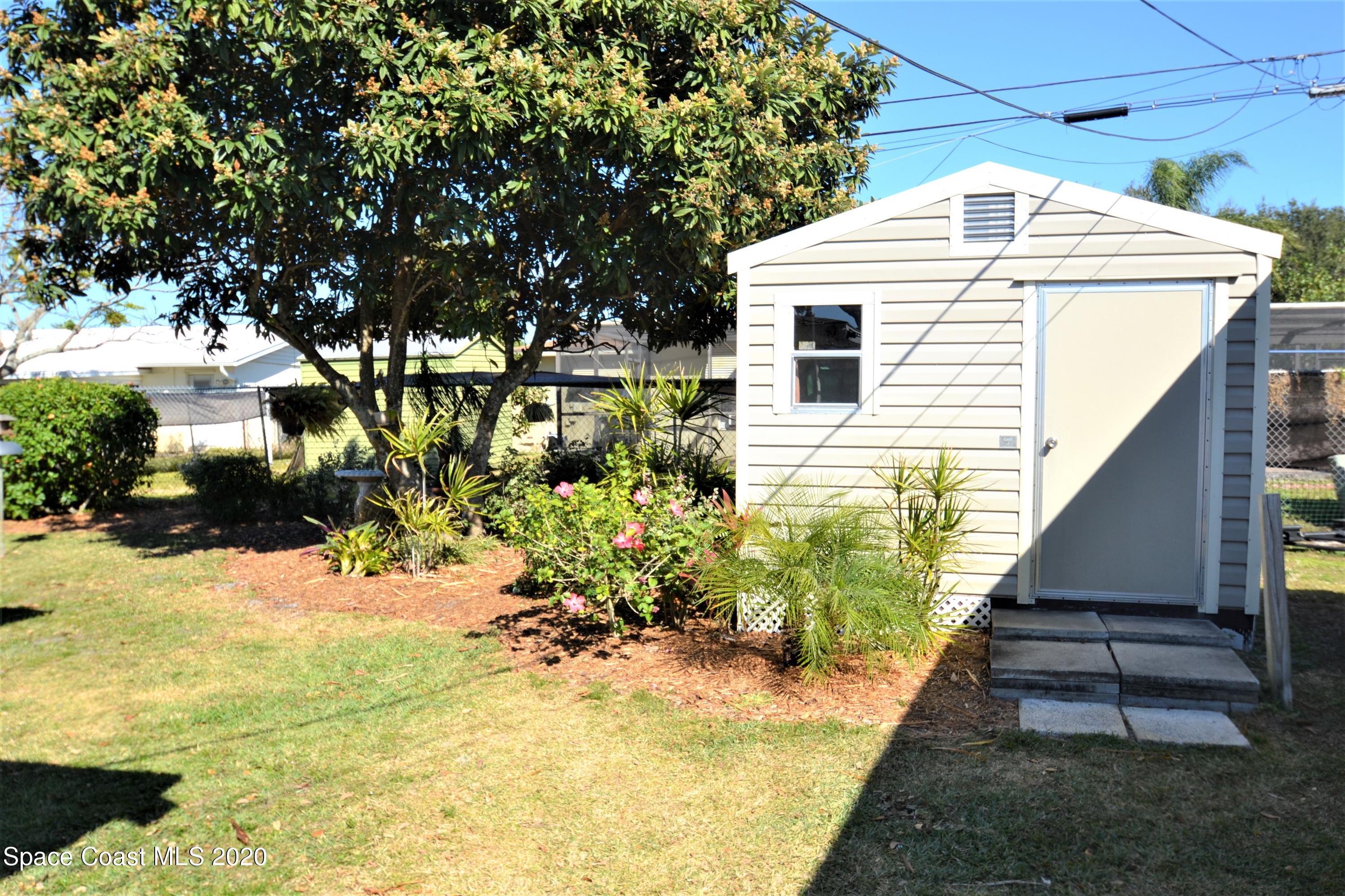 981 Bacon Circle Northeast Palm Bay, FL 32905 - Photo 26 of 26 981 Bacon Cir Backyard (9)