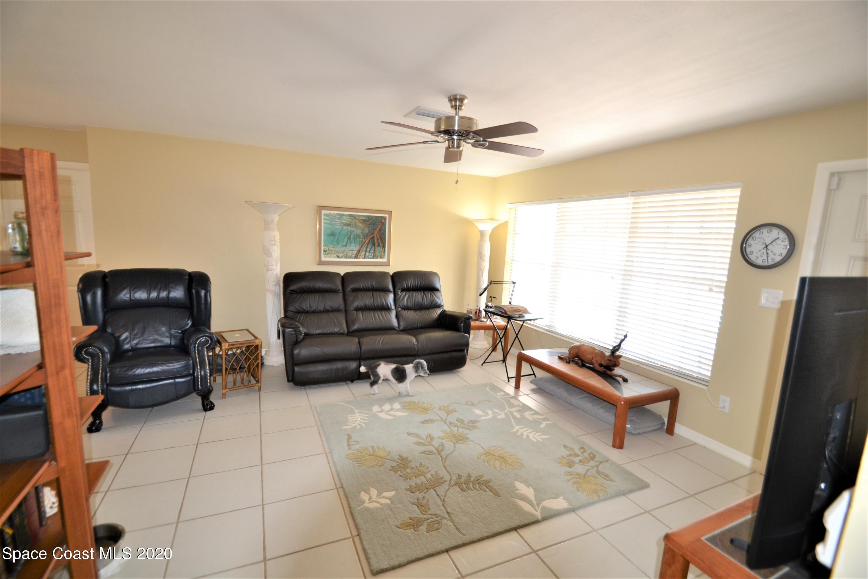 981 Bacon Circle Northeast Palm Bay, FL 32905 - Photo 4 of 26 981 Bacon Cir Family (3)