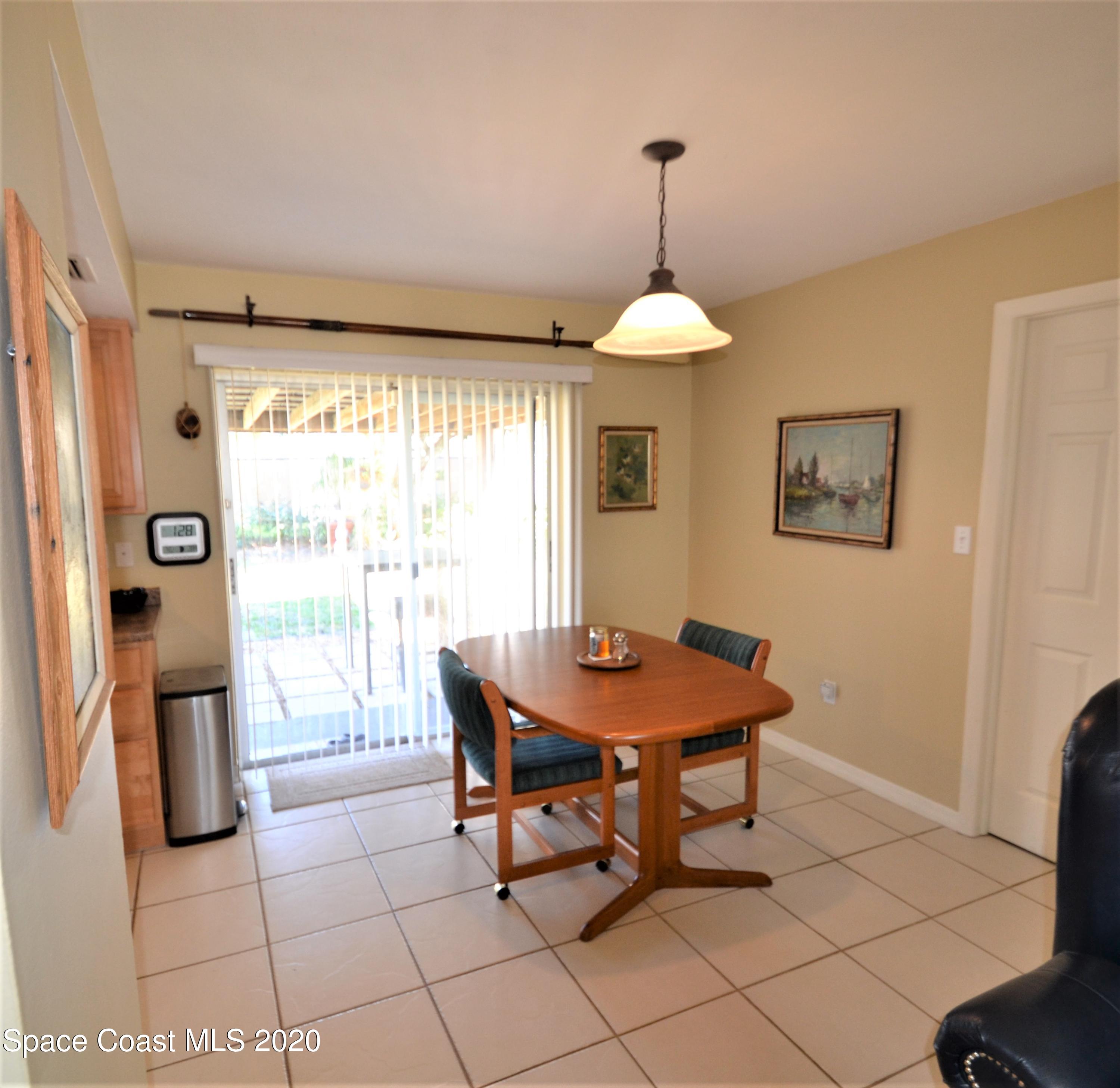 981 Bacon Circle Northeast Palm Bay, FL 32905 - Photo 6 of 26 981 Bacon Cir Dining (2)