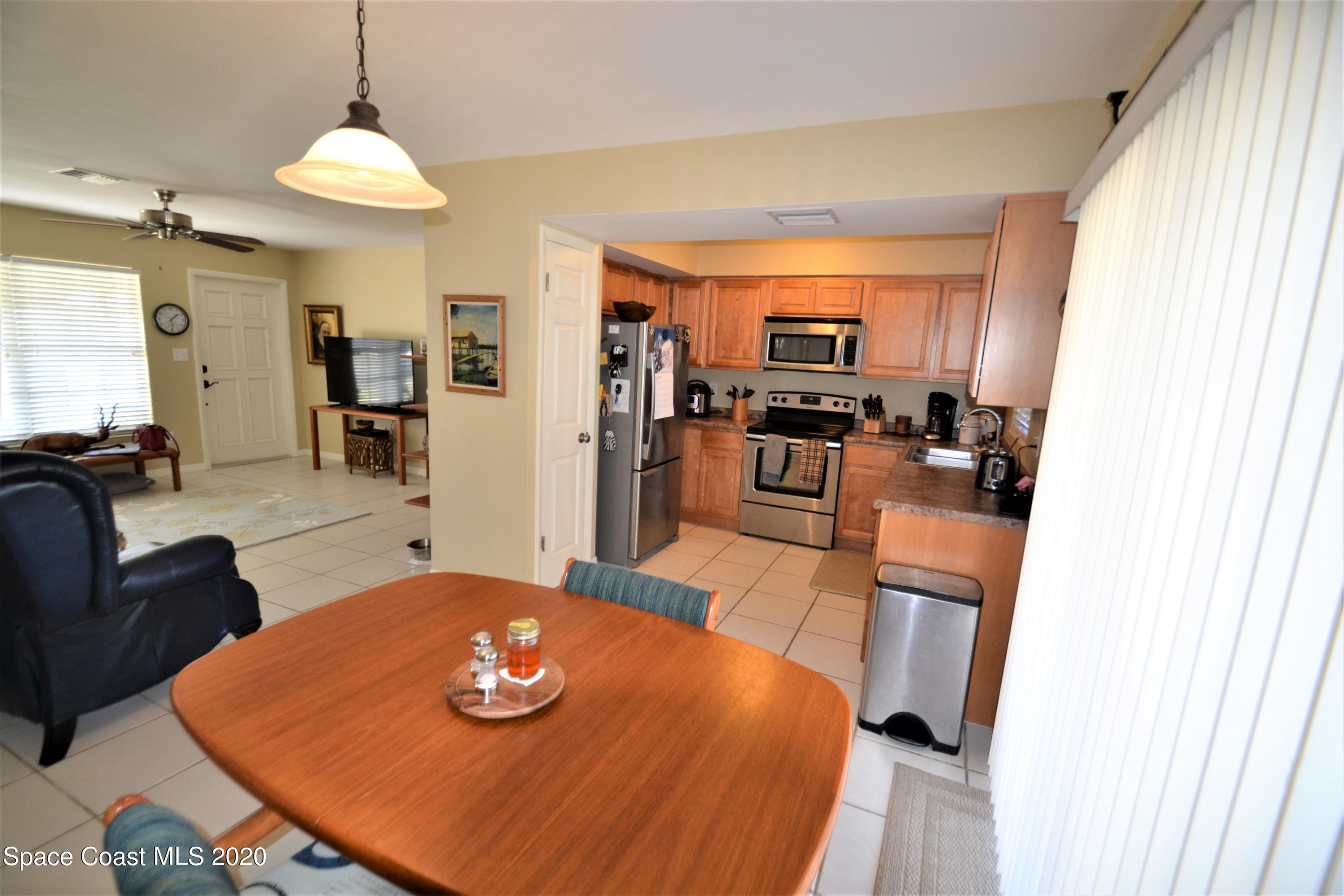 981 Bacon Circle Northeast Palm Bay, FL 32905 - Photo 8 of 26 981 Bacon Cir Dining (9)