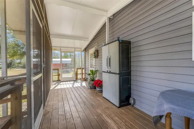 a hallway with wooden floor