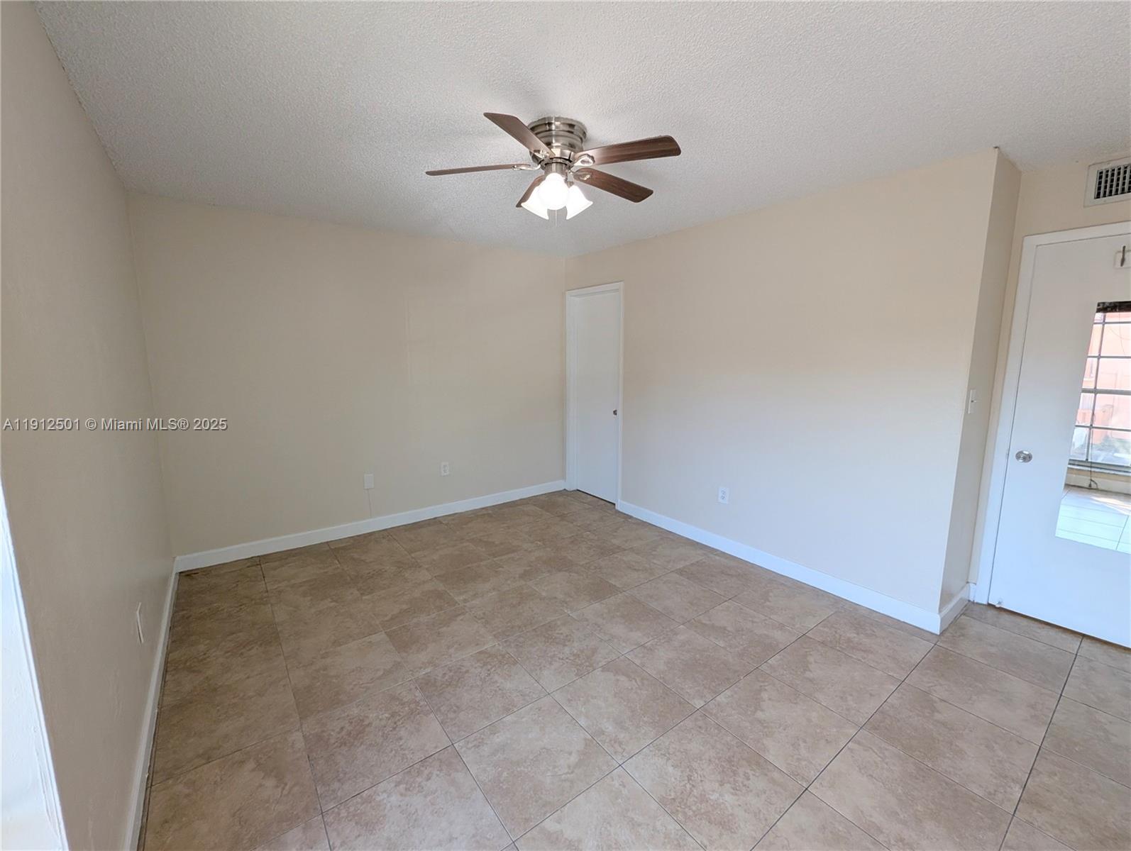 7230 Fairway Drive, Unit F4 Miami Lakes, FL 33014 - Photo 14 of 22 a view of a big room with carpet