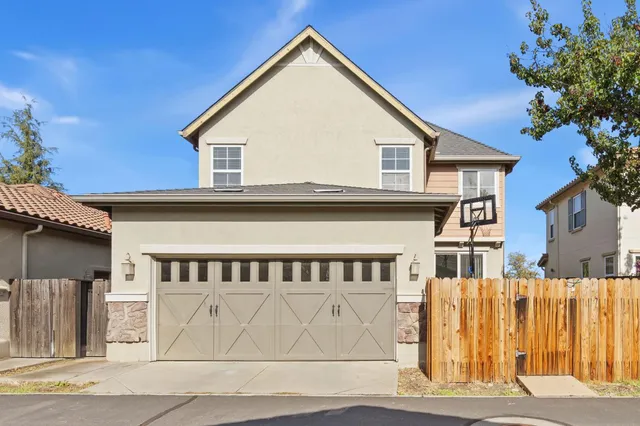 a view of a house with a street