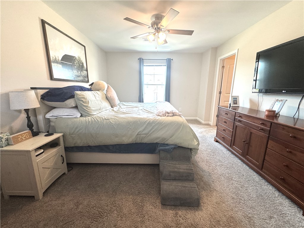 143 Adger Road Pendleton, SC 29670 - Photo 20 of 30 A single window provides natural light to this cozy bedroom finished with plush carpeting.