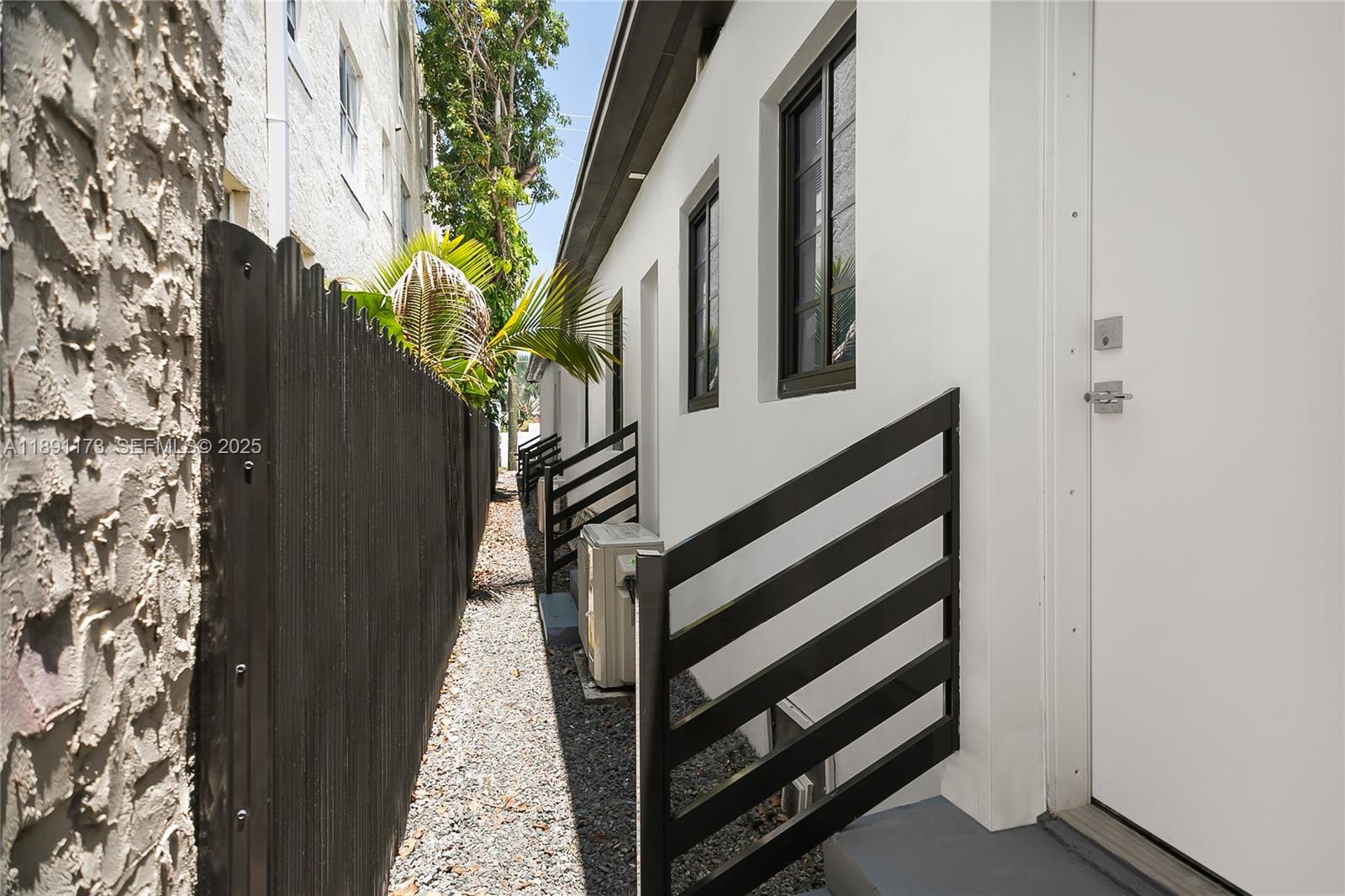 733 Michigan Avenue, Unit 9 Miami Beach, FL 33139 - Photo 12 of 13 a view of a house with a tree