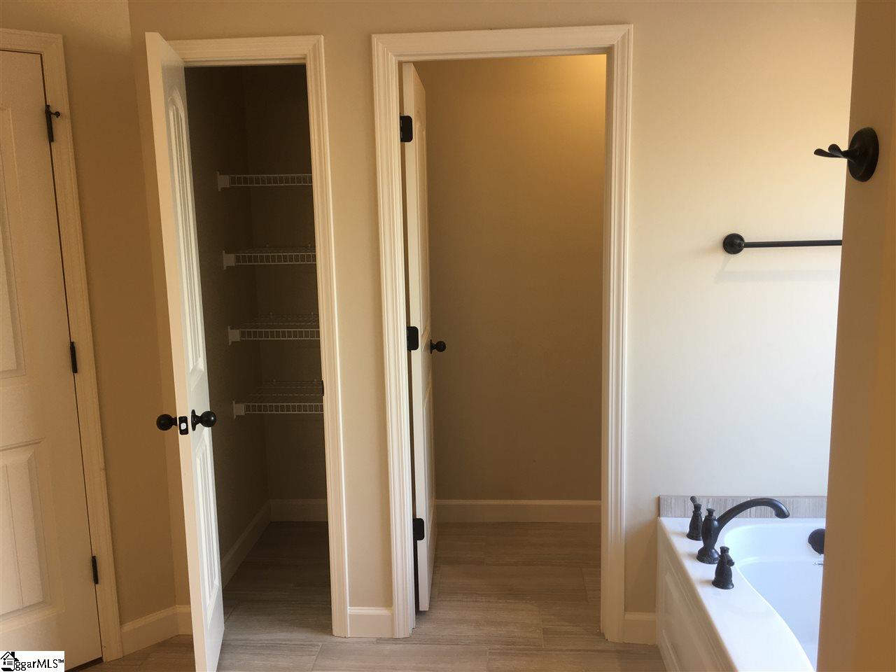 1410 Satterfield Road Greer, SC 29651 - Photo 20 of 26 Linen Closet, Jetted Tub, Water Closet