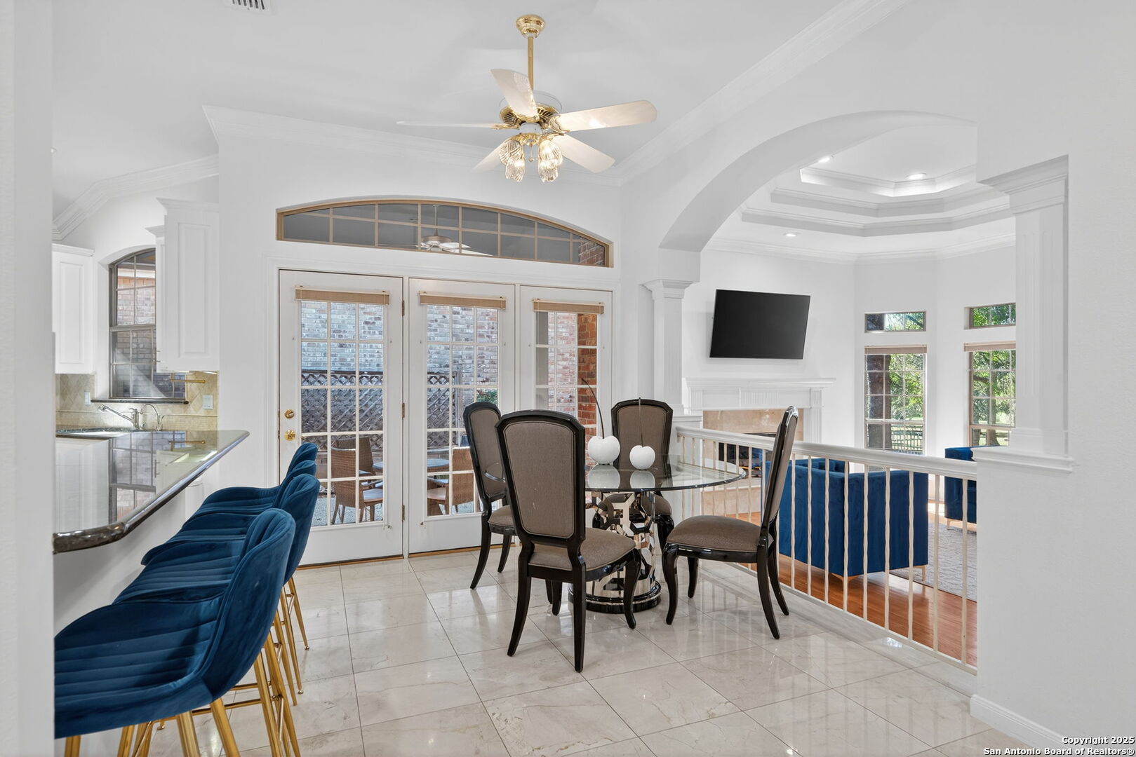 6 Regent Arms San Antonio, TX 78257 - Photo 14 of 29 a view of a dining room with furniture a chandelier and large windows