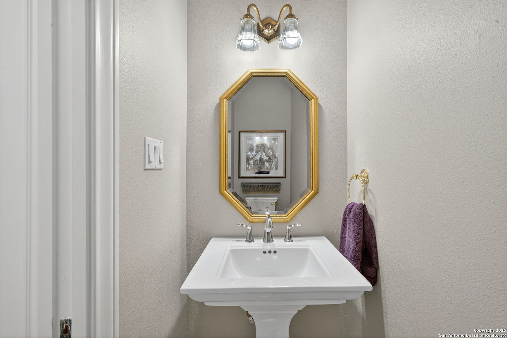 6 Regent Arms San Antonio, TX 78257 - Photo 16 of 29 a bathroom with a sink and a mirror