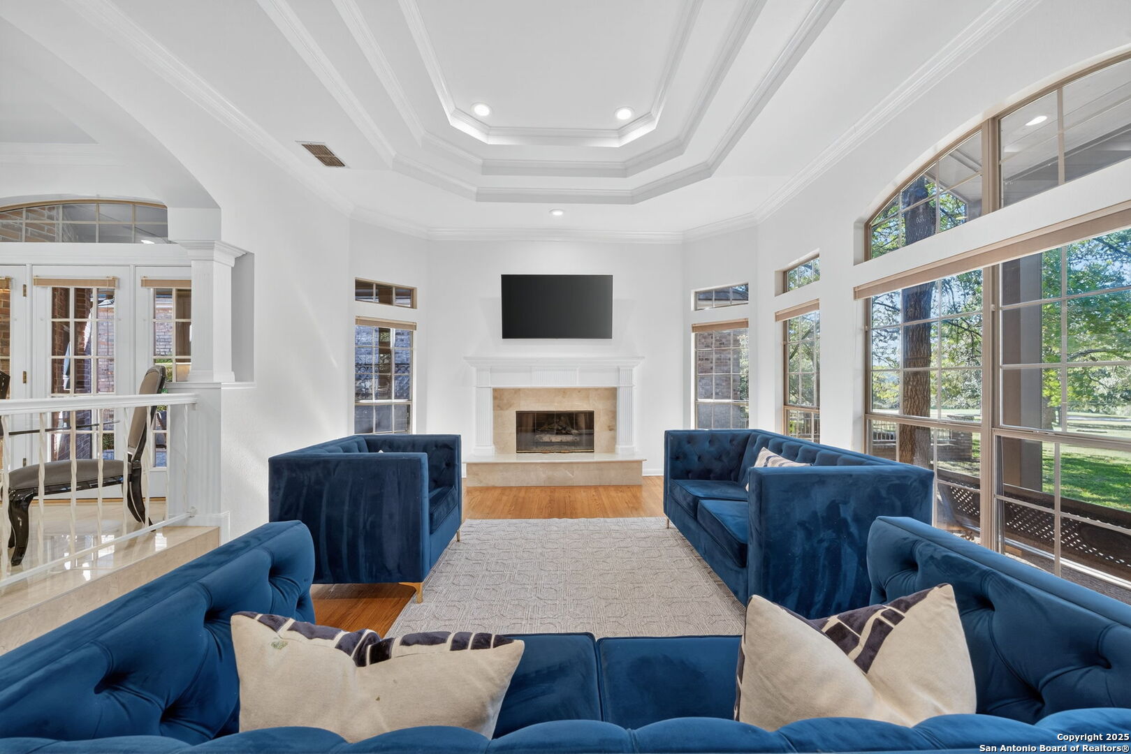 6 Regent Arms San Antonio, TX 78257 - Photo 2 of 29 a living room with furniture fireplace and flat screen tv