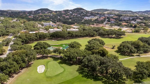 a view of a city with mountains in the background