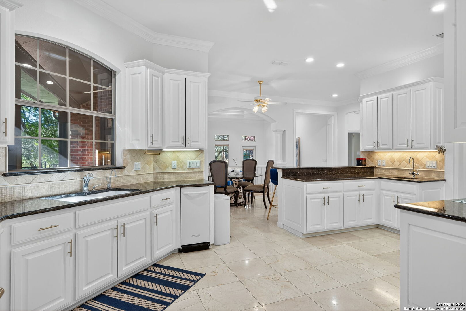 6 Regent Arms San Antonio, TX 78257 - Photo 3 of 29 a kitchen with sink cabinets and window