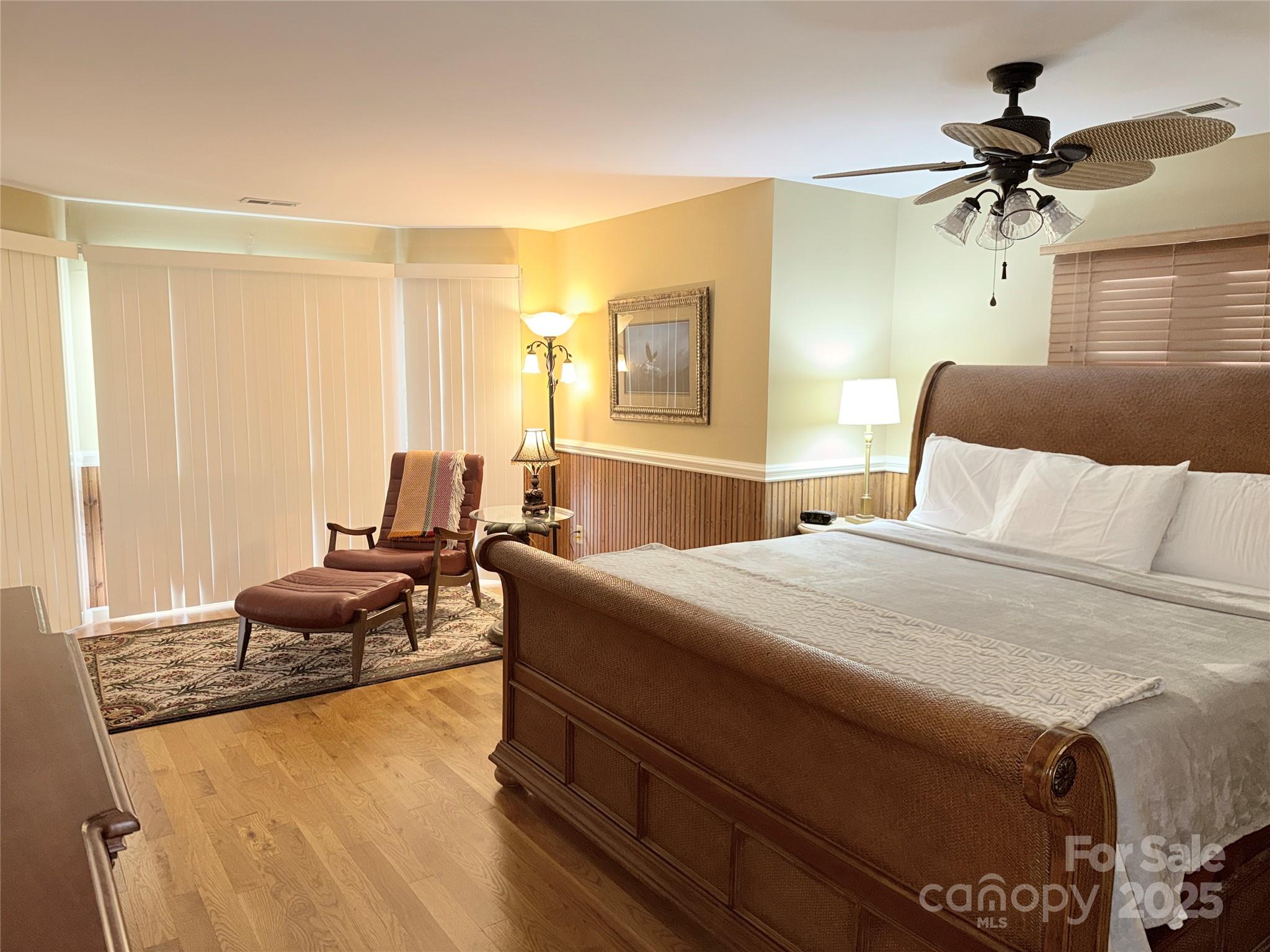 111 Burning Tree Lane, Unit C601 Flat Rock, NC 28731 - Photo 13 of 32 a bedroom with bed couch and window