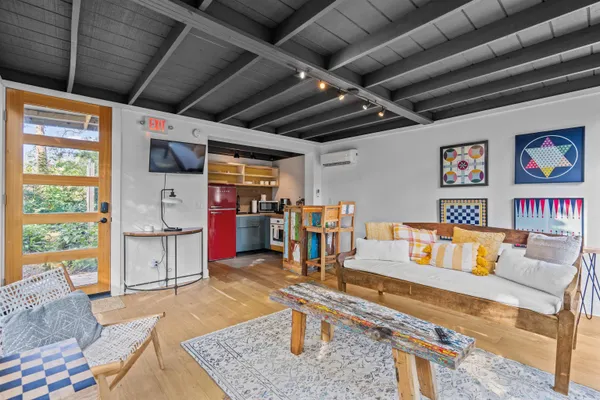 a kitchen with stainless steel appliances granite countertop a refrigerator and a stove